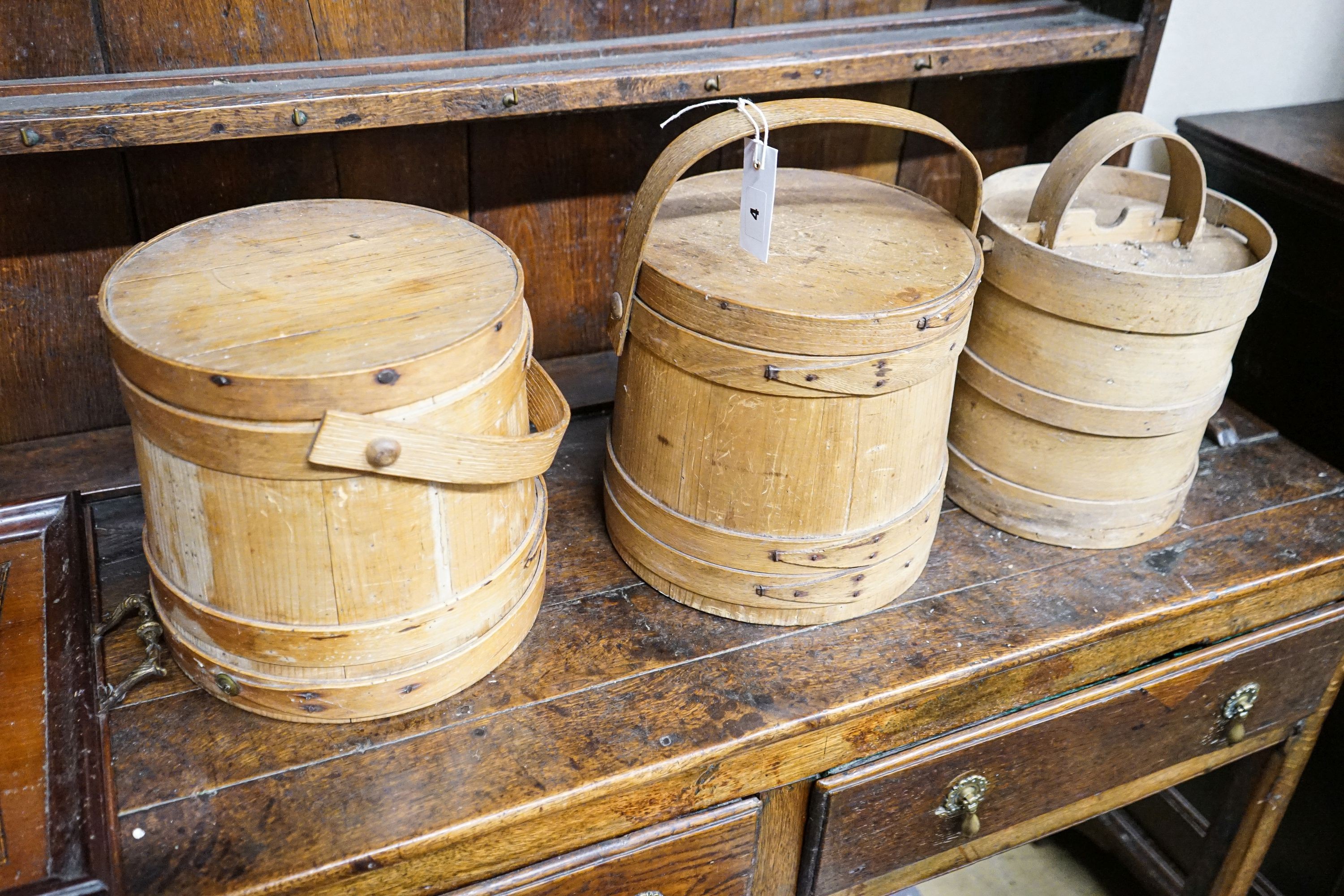 Three wooden butter pails and an Edwardian inlaid walnut tray, width 54cm